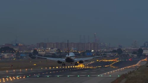 Airplane Landing in the Evening