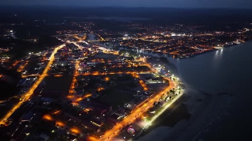 Glowing city lights at night from above