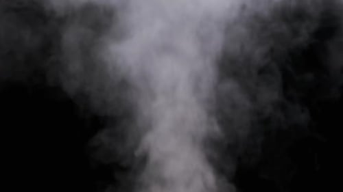 Real Explosion Vapor or Smoke Clouds Rise Up on Black Background in Slow Motion