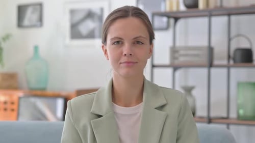 Portrait of Serious Young Businesswoman in Creative Office