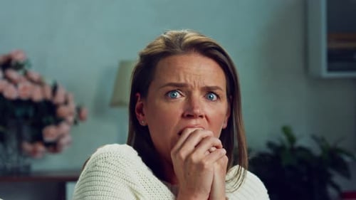Surprised face and eyes of woman with fear of bad news