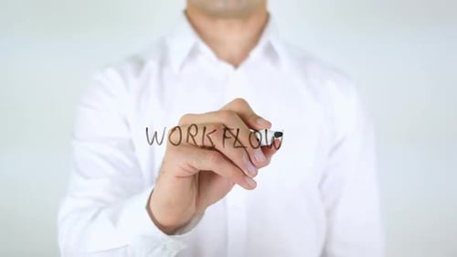 WorkFlow Man Writing on Glass