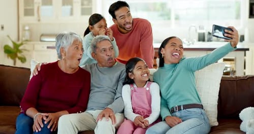 Multi-generational Family Poses for Photo at Home