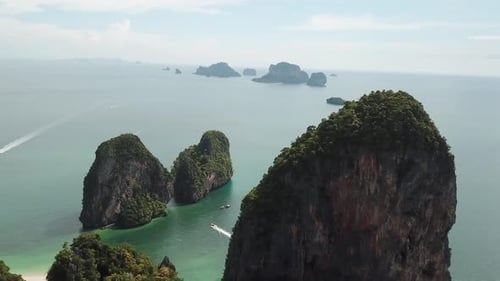 Drone Aerial View on Limestone Seacliffs Over Tropical Sea. Typical Seascape of Thailand Marine Coas