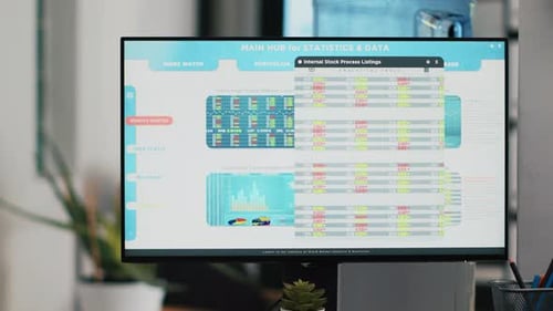 Stock Market Data Displayed on Monitor