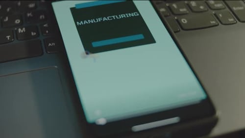 Manufacturing Standards Inscription on Smartphone Screen Graphic Presentation of Factory Manager