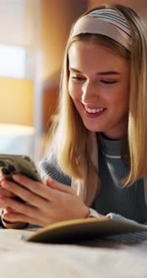 Phone, college student or study break in bedroom, reading chat message or notification for social