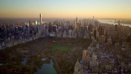 Aerial View of Central Park Highlights the Stunning Manhattan Skyline at Sunset