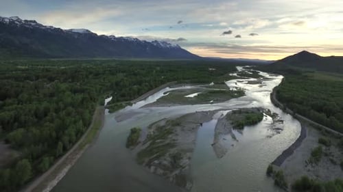 Drone View Of Sunset Sky With Snowcapped Mountains And River 4