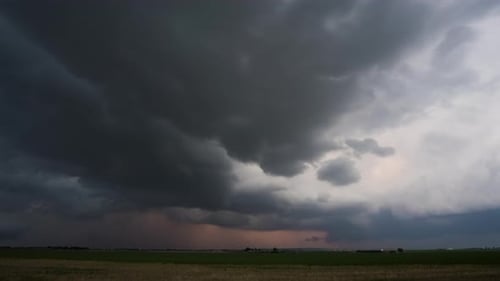 Stormy Sky over Rural Landscape