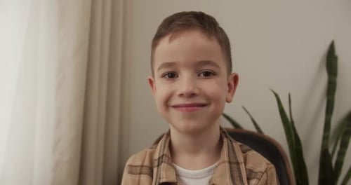 Happy Young Boy Smiling Indoors Portrait