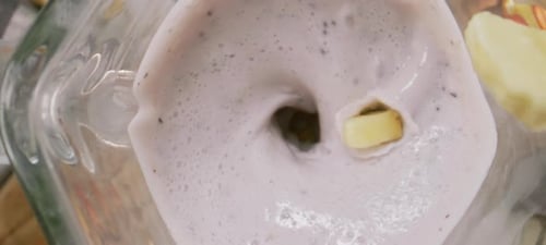 Making of delicious smoothie in blender