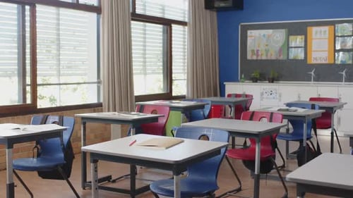 Empty Classroom with Desks and Colorful Decorations
