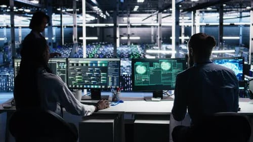 Server Farm Programmers Seeing Hacking Warning Working to Secure Systems