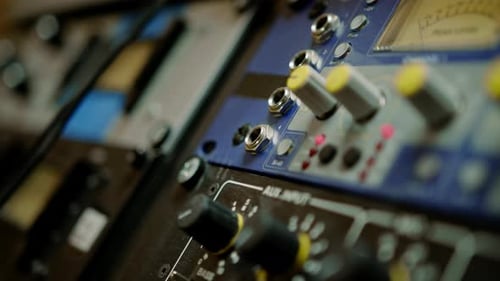 sound engineer connects Audio cable Professional wires with connectors to music equipment recording