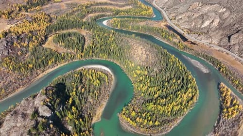 Meandering river in a scenic autumn mountain valley