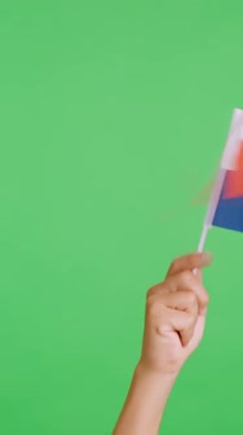 Hand Waving a Flag on Green Screen