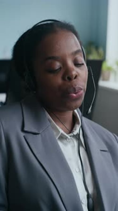 Operators of Call Center Talking to Online Customers by Their Workplaces