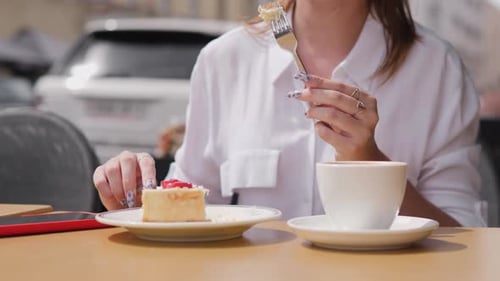 Enjoying Dessert at a Cafe With a Beautiful View Indulging in Sweet Flavors and Cozy Atmosphere