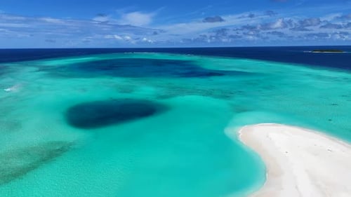 A tropical island with crystal clear ocean water. Maldives