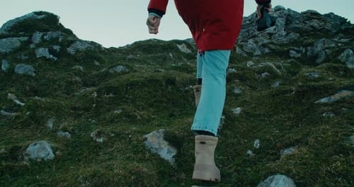 Woman Feet Closeup Climb Mountain on Vacation Trip Hold Vintage Camera in Hand