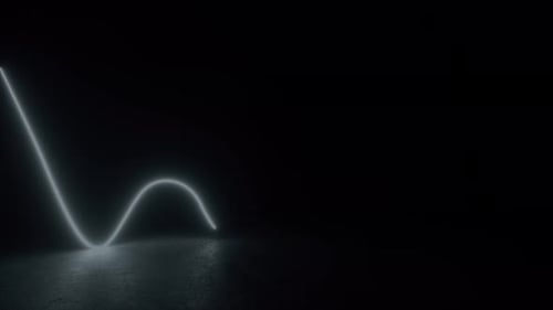 Pink Light Radiating Against Black Background