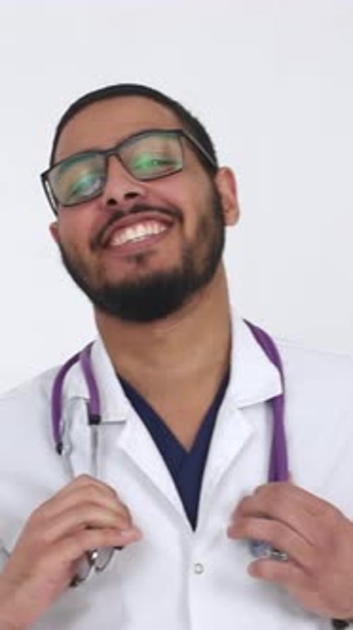Smiling Man Wearing Stethoscope and Glasses