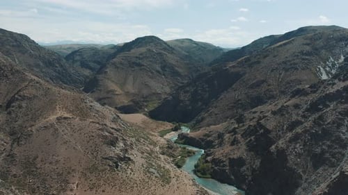 Aerial Photography Of Mountains And Mountain River On A Sunny Day