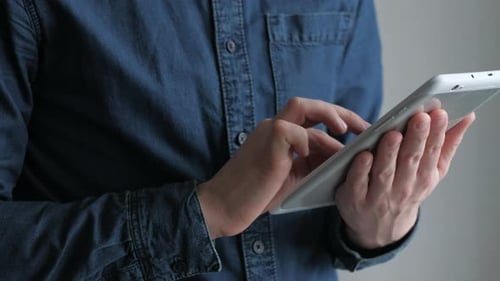 Adult Hands Use Tablet for Communication