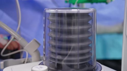 Hospital Ventilator Assisting Patient's Breathing in Operating Room