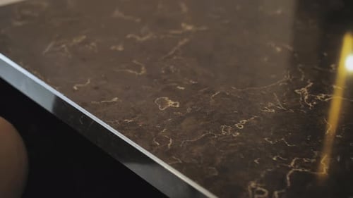 Closeup Shot of Beautiful Granite Black Counter Top Camera Moving Slow Motion