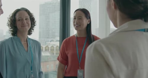 Diverse Team Meeting in Modern Office Setting