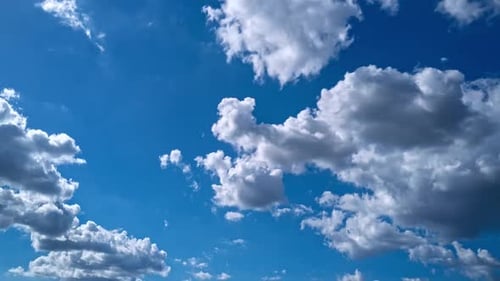 Clouds Drifting in a Blue Sky
