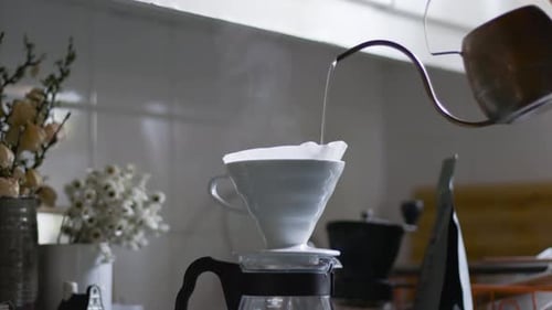 Pour Over Coffee Brewing in Bright Kitchen