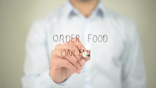 Order Food Online Man Writing on Transparent Screen