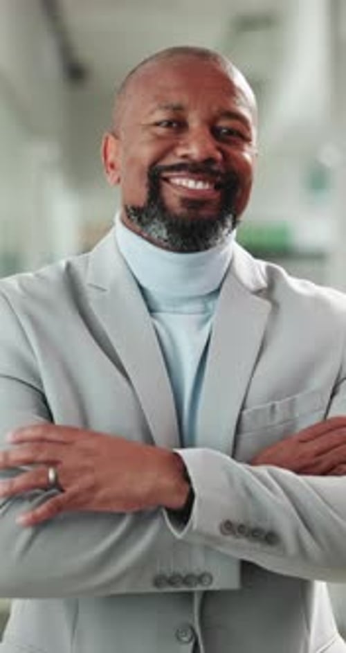 Face, business and black man with arms crossed in office for career pride, about us and real estate