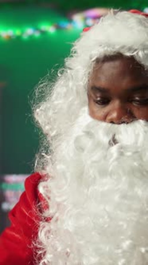 Man in Santa Claus Costume Looking Down