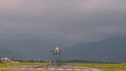 Passenger airplane taking off from runway
