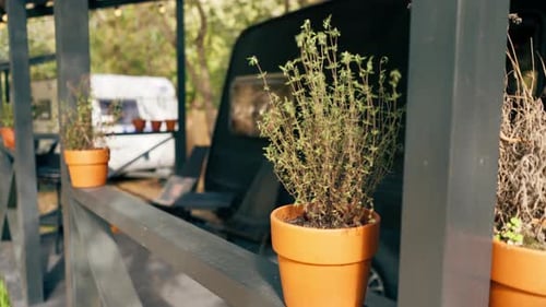 A mobile home with a terrace is located in country glamping site for relaxation and solitude nature