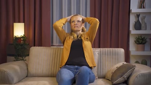 The woman swaying nervously in her seat.