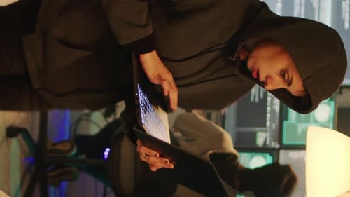 Woman Coding at Desk in Vertical Video