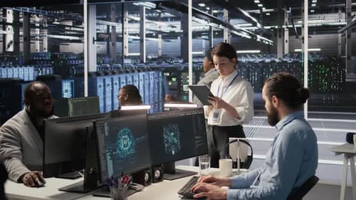 Data Center Team of Technicians Working on Neural Network Software Development