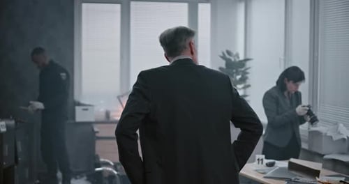 Office Robbery Case Crime Investigation Team Working at Crime Scene