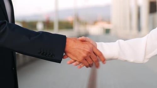 Successful Business People Handshake Outside the Office