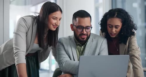 Team, office and pointing at laptop for planning in workplace, meeting and smile as employees