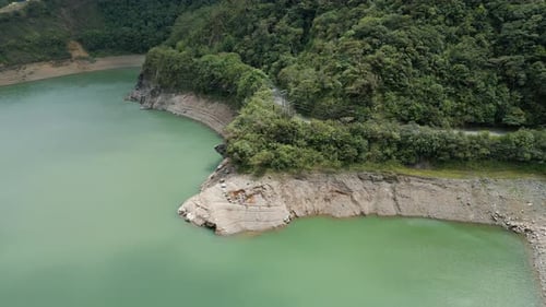Aerial Lakeside Low Water Level. Flying Over Lake Calima
