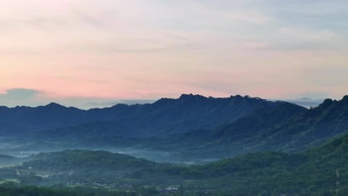 Aerial scenery of Menoreh hill in slightly foggy morning, Indonesia.