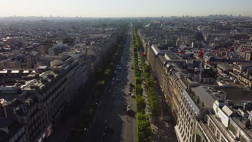 Aerial backward of Champs Elysées in Paris. High angle