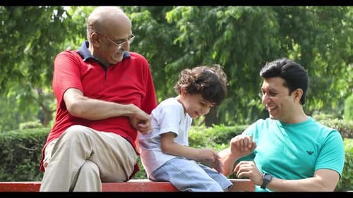 Three Generations Enjoying Time Together in Park