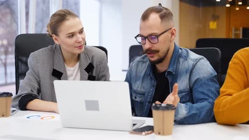 Office Employees Sit and Discuss on Startup Project in Conference Room with Charts Team of Business
